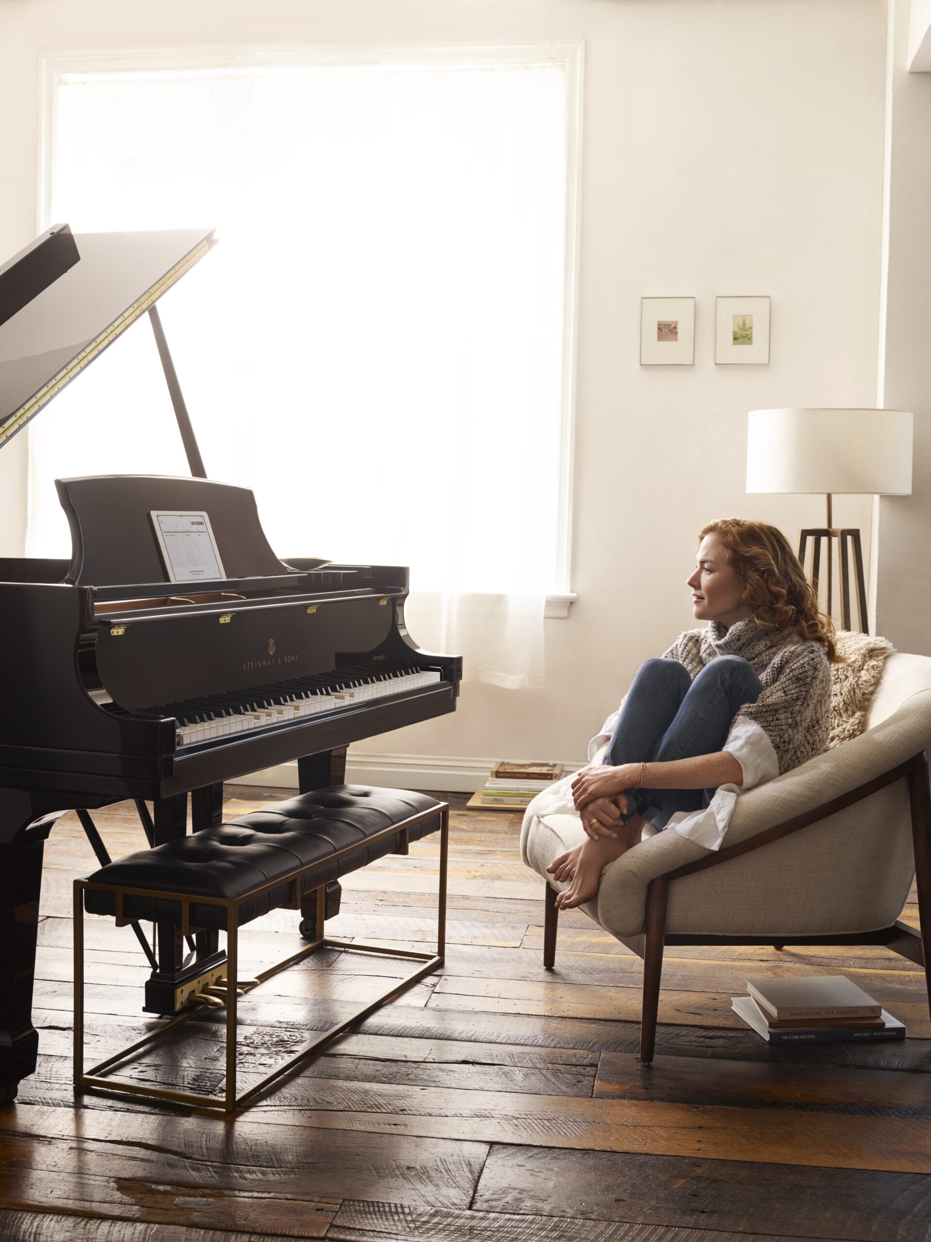 Woman_seated_with_Spirio_with_no_socks_Dock_of_the_Bay_ipad